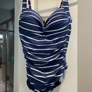 Summer’s on the way! Very flattering NipTuck swimsuit, size 12.